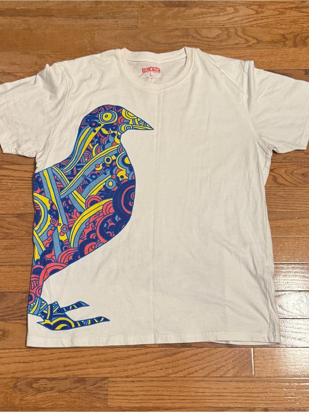 Staple White Tee with Multicolor Psychedelic Bird Graphic